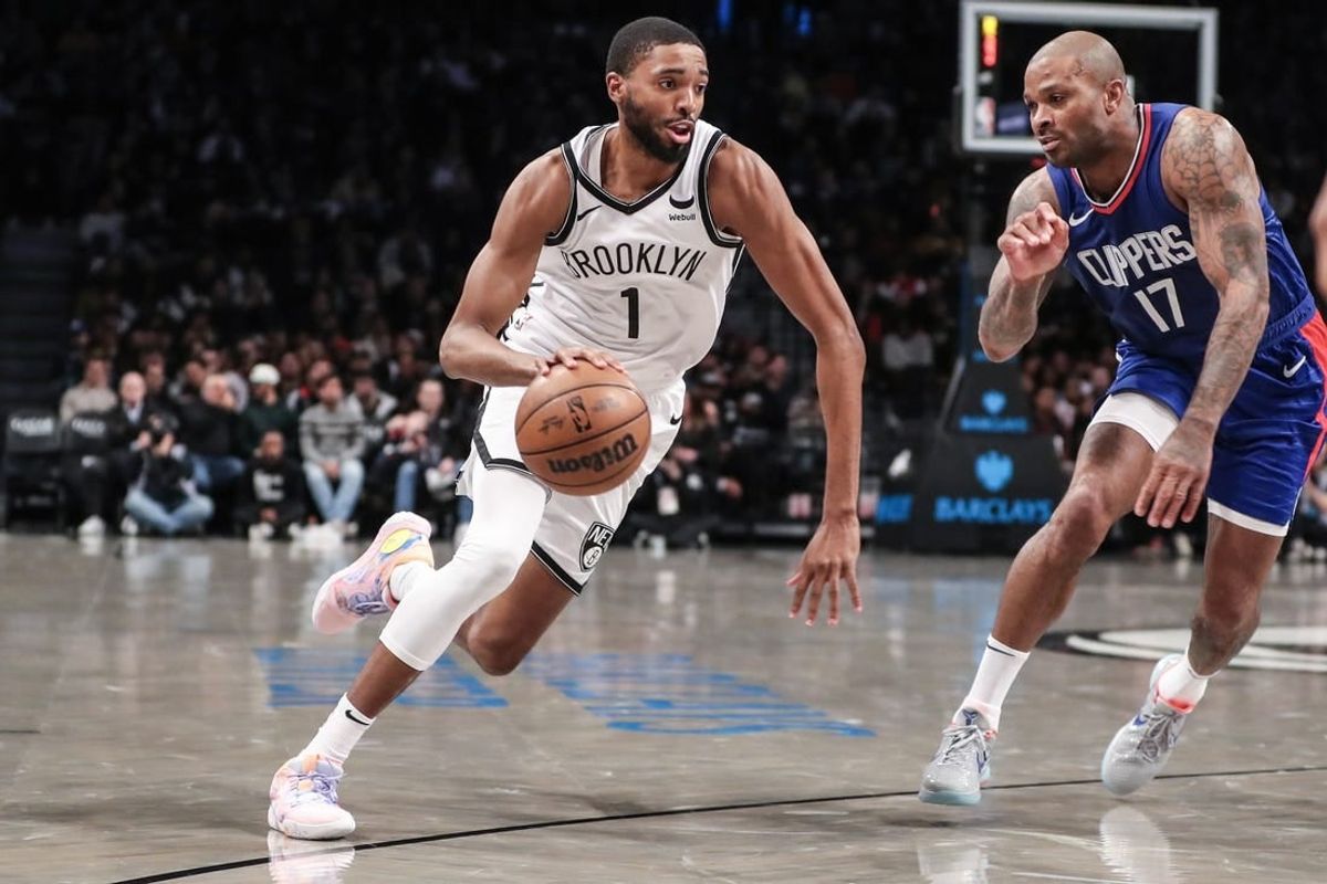 Nov 8, 2023; Brooklyn, New York, USA;  Brooklyn Nets forward Mikal Bridges (1) looks to drive past LA Clippers forward P.J. Tucker (17) in the second quarter at Barclays Center.