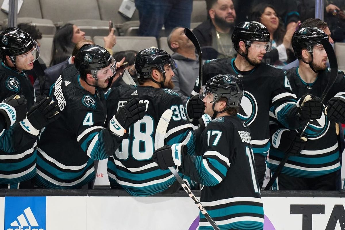 Mar 23, 2024; San Jose, California, USA; San Jose Sharks center Thomas Bordeleau (17) shakes hands with his teammates on the bench after scoring a goal against the Chicago Blackhawks during the first period at SAP Center at San Jose.