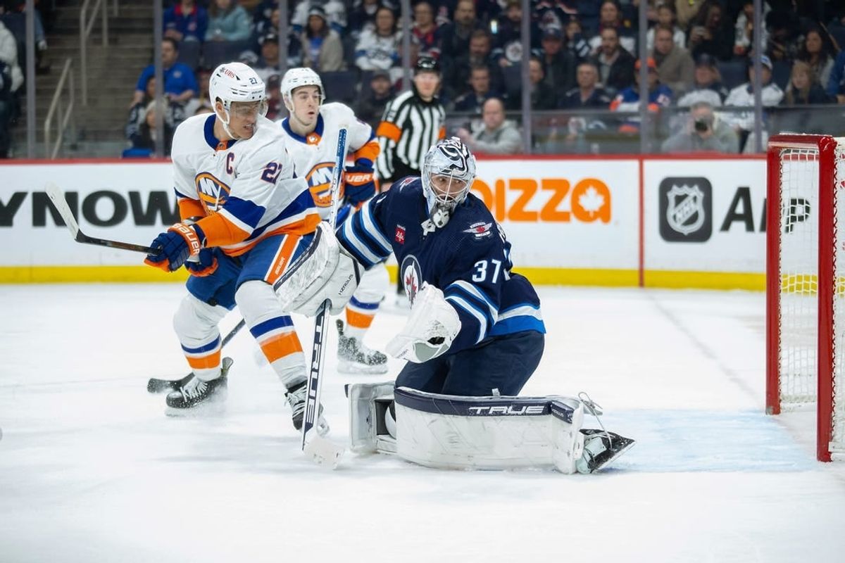 Jan 16, 2024; Winnipeg, Manitoba, CAN; New York Islanders forward Anders Lee (27) (not shown) scores on Winnipeg Jets goalie Connor Hellebuyck (37) during the first period at Canada Life Centre.