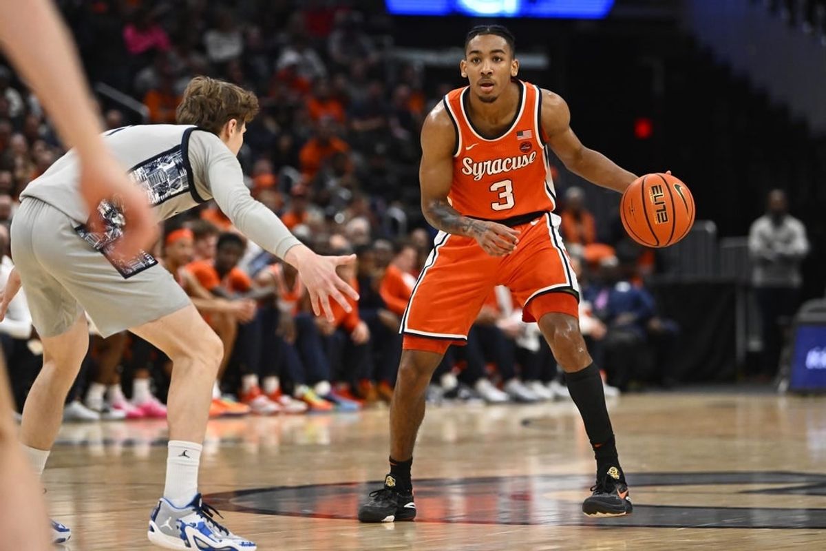 Dec 9, 2023; Washington, District of Columbia, USA; Syracuse Orange guard Judah Mintz (3) dribbles as Georgetown Hoyas guard Rowan Brumbaugh (1) defends during the first half at Capital One Arena.