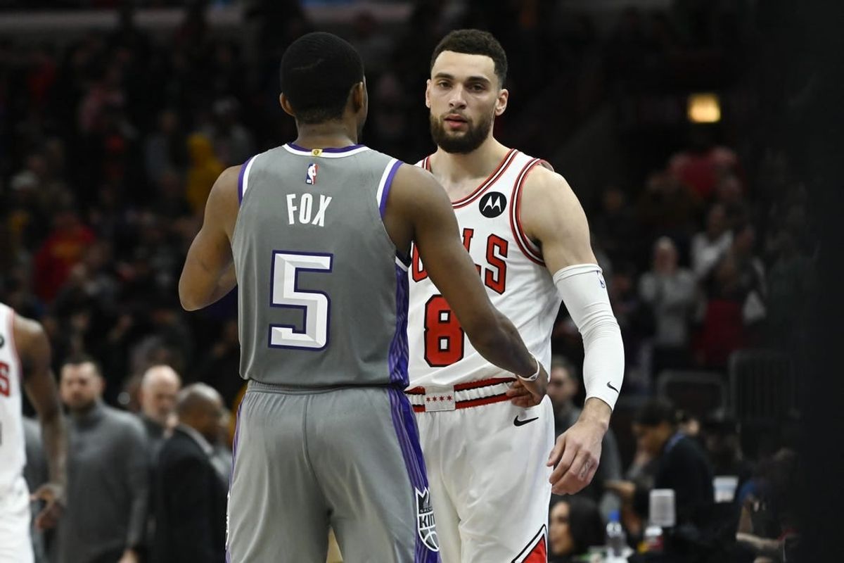 Mar 15, 2023; Chicago, Illinois, USA; Sacramento Kings guard De'Aaron Fox (5) and Chicago Bulls guard Zach LaVine (8) talk after the game at the United Center.