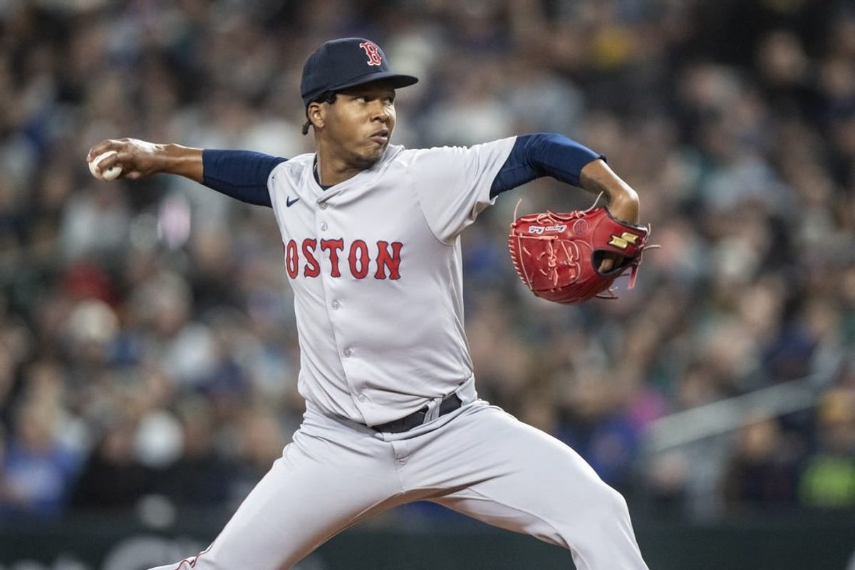 Mar 28, 2024; Seattle, Washington, USA; Boston Red Sox starter Brayan Bello (66) delivers a pitch during the first inning against the Seattle Mariners at T-Mobile Park.