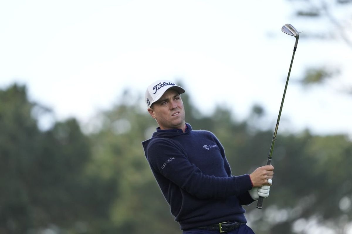 Feb 1, 2024; Pebble Beach, California, USA; Justin Thomas hits his fairway shot on the 10th hole during the first round of the AT&T Pebble Beach Pro-Am golf tournament at Spyglass Hill Golf Course.