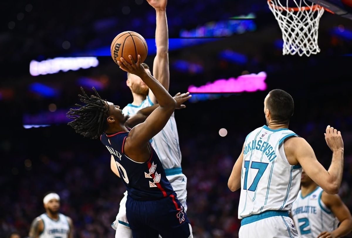 Mar 16, 2024; Philadelphia, Pennsylvania, USA; Philadelphia 76ers guard Tyrese Maxey (0) shoots against Charlotte Hornets forward Davis Bertans (9) in the second quarter at Wells Fargo Center.