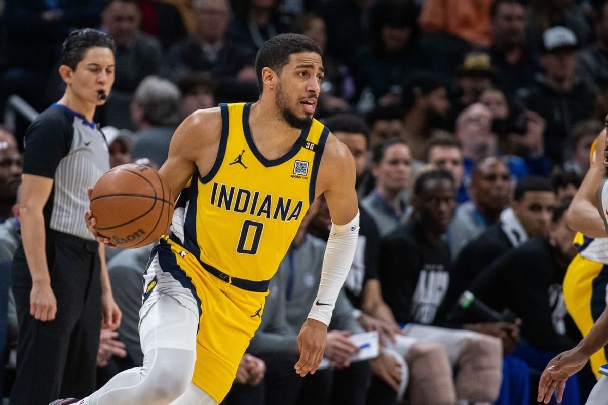 Feb 2, 2024; Indianapolis, Indiana, USA; Indiana Pacers guard Tyrese Haliburton (0) dribbles the ball in the second half against the Sacramento Kings at Gainbridge Fieldhouse.