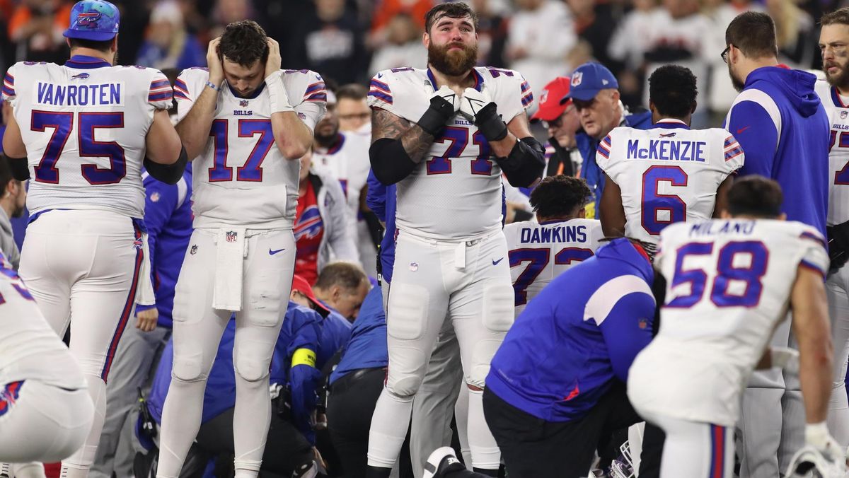 Josh Allen and his teammates wait for news on Damar Hamlin’s injury on Monday night.