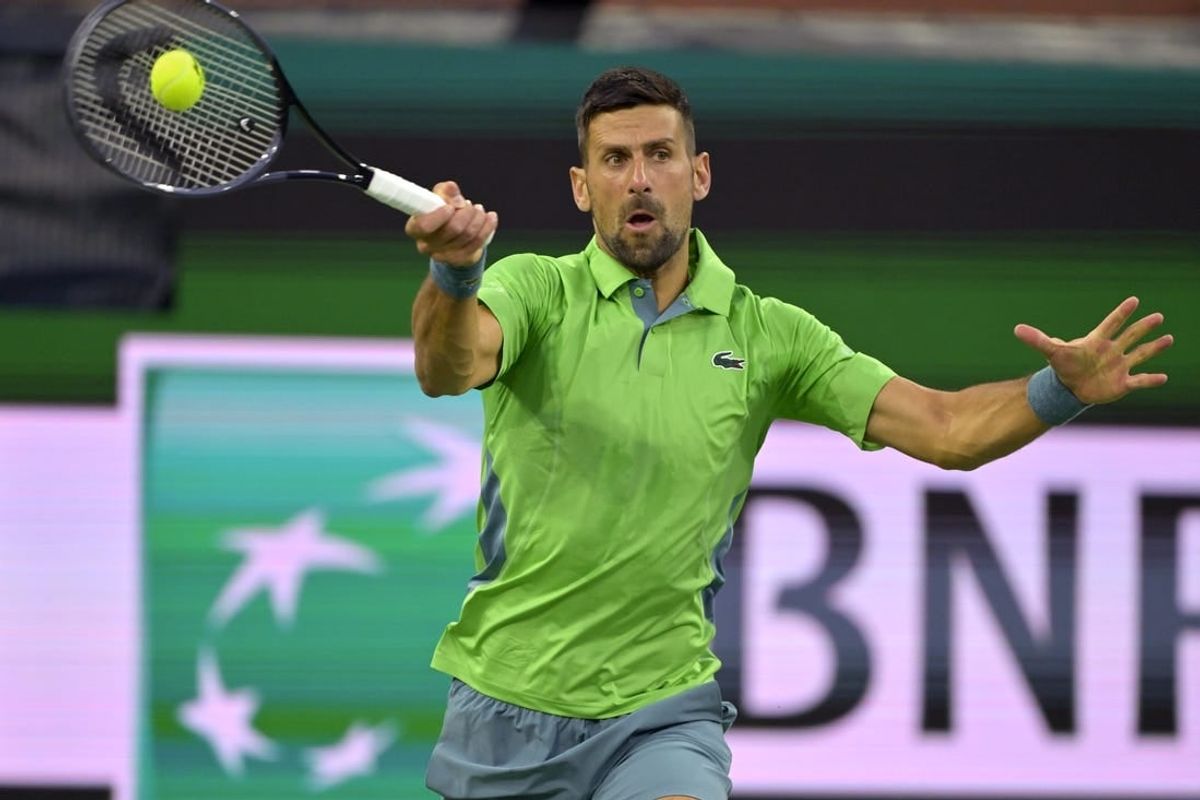 Mar 11, 2024; Indian Wells, CA, USA;  Novak Djokovic (SRB) hits a shot in his third round match against Luca Nardi (ITA) in the BNP Paribas Open at the Indian Wells Tennis Garden.