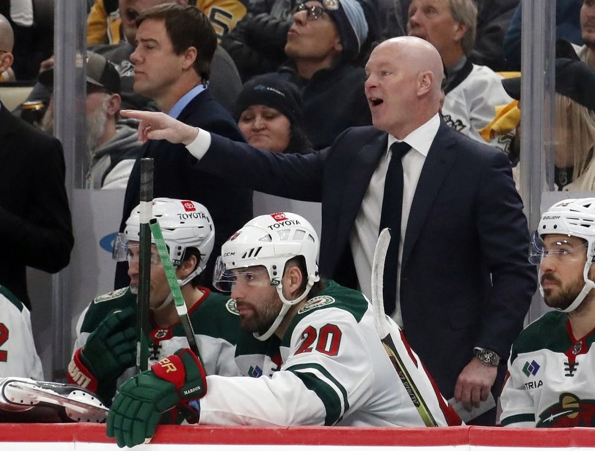 Dec 18, 2023; Pittsburgh, Pennsylvania, USA;  Minnesota Wild head coach John Hynes gestures from the bench against the Pittsburgh Penguins during the third period at PPG Paints Arena. Pittsburgh won 4-3.