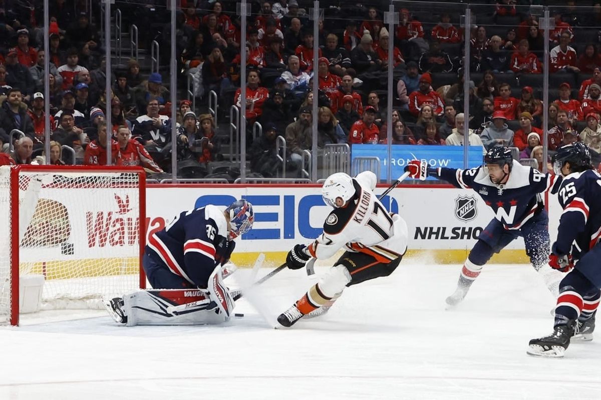 Jan 16, 2024; Washington, District of Columbia, USA; Anaheim Ducks left wing Alex Killorn (17) skates in on Washington Capitals goaltender Darcy Kuemper (35) as Capitals center Evgeny Kuznetsov (92) defends in the second period at Capital One Arena.
