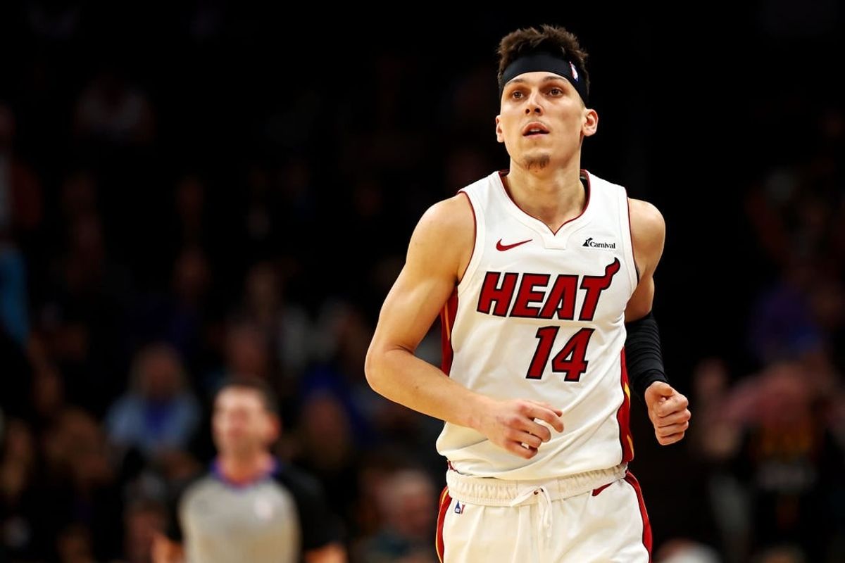 Jan 5, 2024; Phoenix, Arizona, USA; Miami Heat guard Tyler Herro (14) reacts after a play during the third quarter of the game against the Phoenix Suns at Footprint Center.