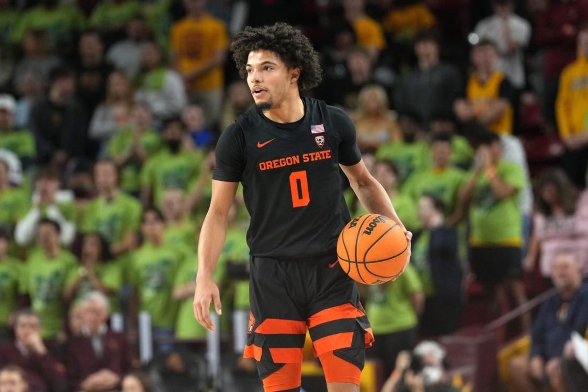 Feb 2, 2023; Tempe, Arizona, USA; Oregon State Beavers guard Jordan Pope (0) dribbles against the Arizona State Sun Devils during the first half at Desert Financial Arena.