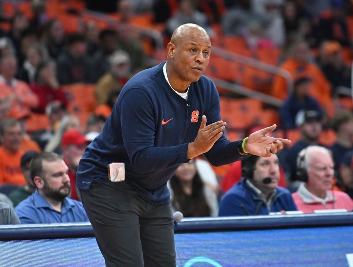 Dec 5, 2023; Syracuse, New York, USA; Syracuse Orange head coach Adrian Autry encourages his players on the court against the Cornell Big Red in the second half at the JMA Wireless Dome.