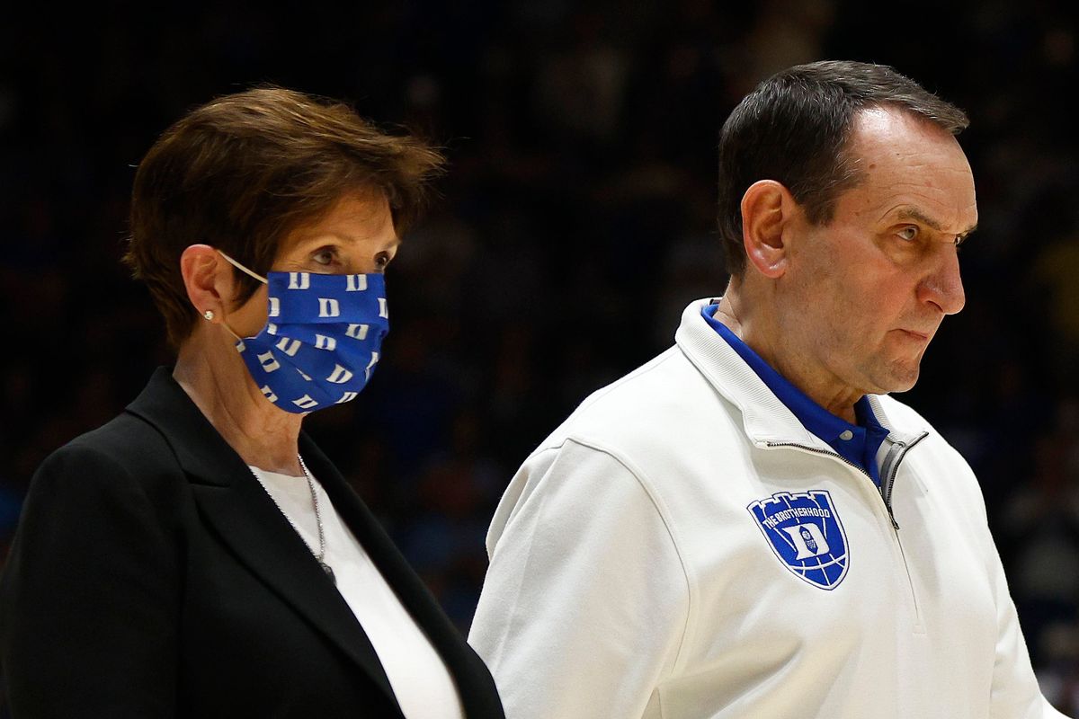 Mike Krzyzewski (r., looking nefarious)