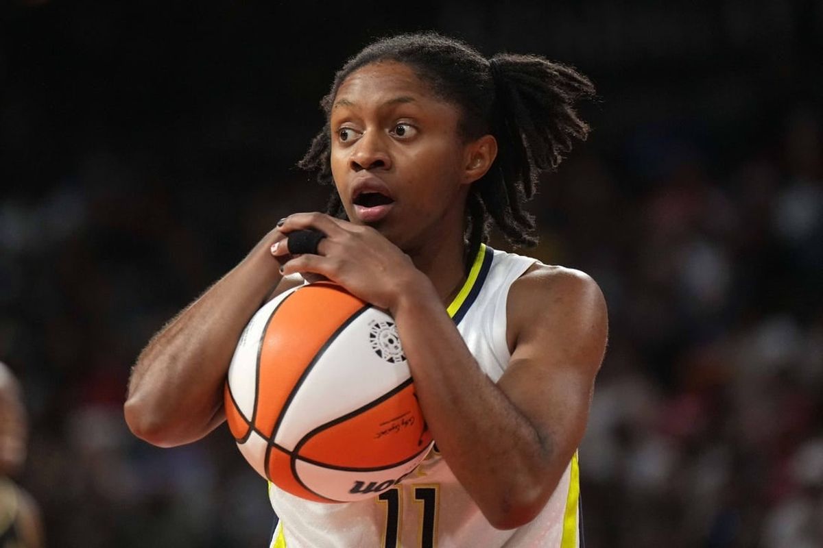Sep 24, 2023; Las Vegas, Nevada, USA; Dallas Wings guard Crystal Dangerfield (11) reacts during game one of the 2023 WNBA Semifinals against the Las Vegas Aces at Michelob Ultra Arena. The Aces defeated the Wings 97-83.