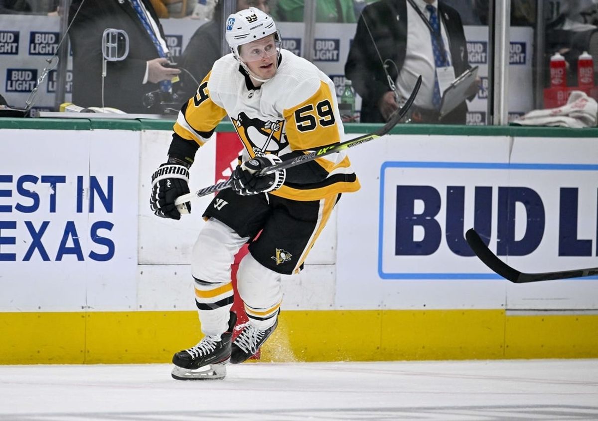 Mar 23, 2023; Dallas, Texas, USA; Pittsburgh Penguins left wing Jake Guentzel (59) in action during the game between the Dallas Stars and the Pittsburgh Penguins at American Airlines Center.