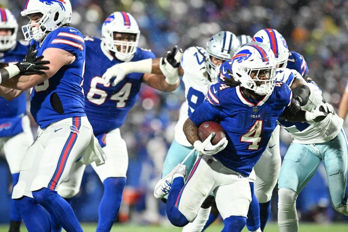 Dec 17, 2023; Orchard Park, New York, USA; Buffalo Bills running back James Cook (4) runs the ball in the second half against the Dallas Cowboys at Highmark Stadium.
