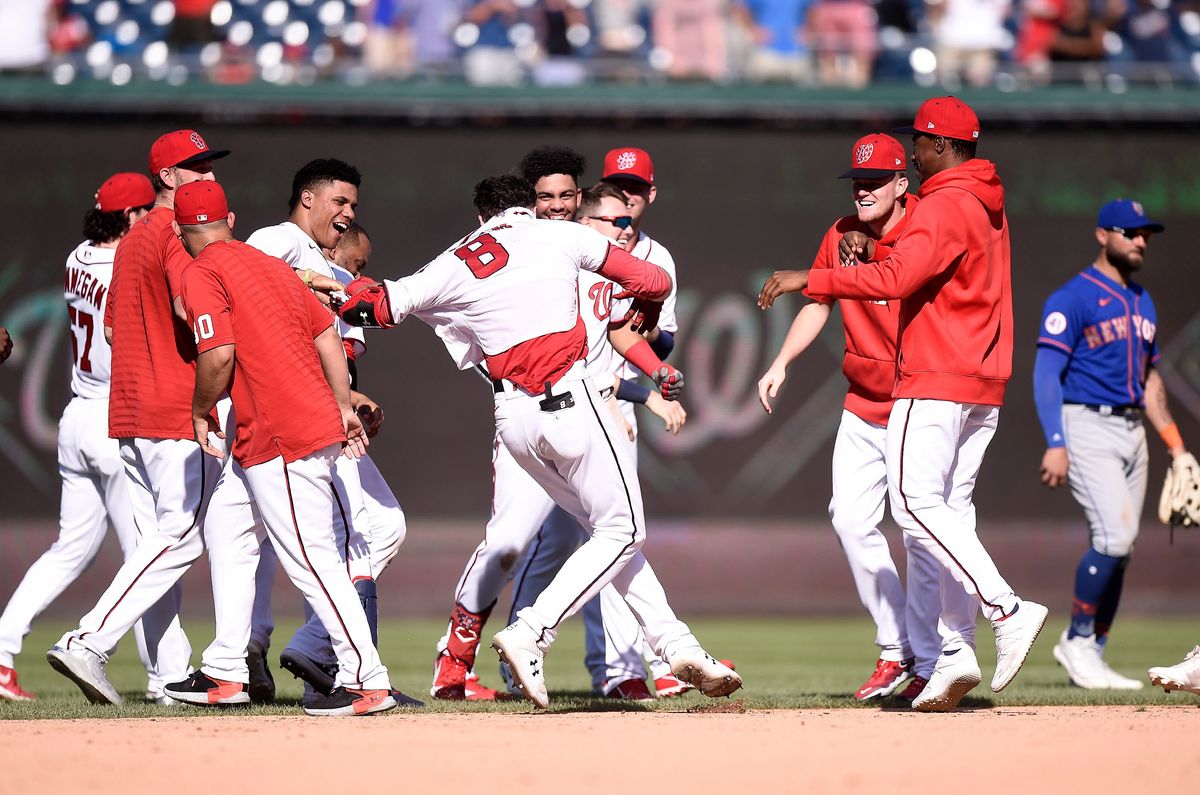 The Nationals celebrate a Carter Kieboom game-winner against the 69-69 Mets, who are nothing if not upside down.