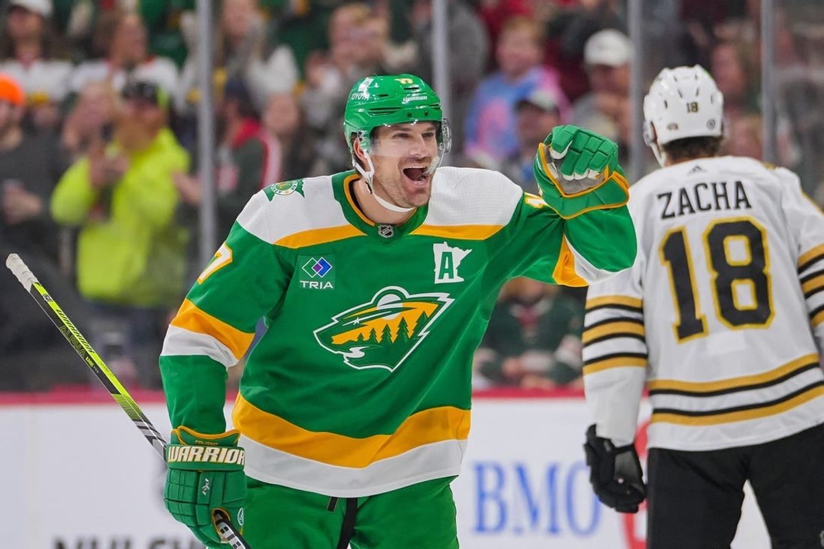 Dec 23, 2023; Saint Paul, Minnesota, USA; Minnesota Wild left wing Marcus Foligno (17) celebrates his goal against the Boston Bruins in the third period at Xcel Energy Center.
