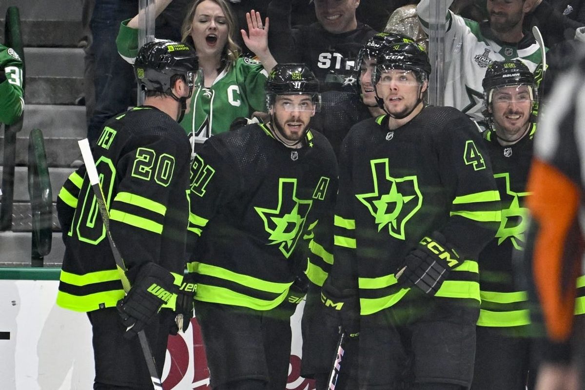 Dec 31, 2023; Dallas, Texas, USA; Dallas Stars center Tyler Seguin (91) and left wing Mason Marchment (27) and defenseman Miro Heiskanen (4) and center Matt Duchene (95) celebrates a goal scored by Seguin against the Chicago Blackhawks during the first period at the American Airlines Center.