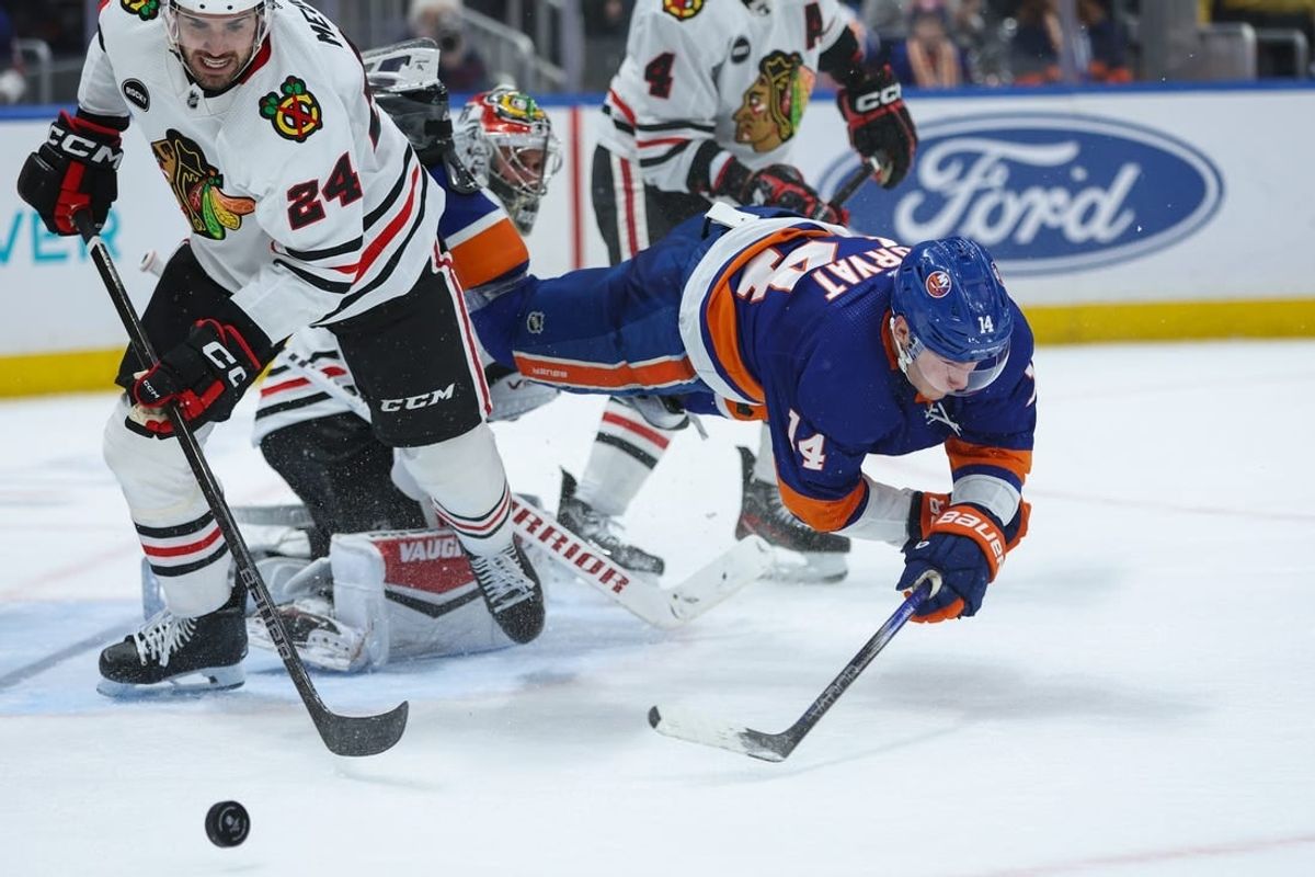 Apr 2, 2024; Elmont, New York, USA; New York Islanders center Bo Horvat (14) after shot in front of the goal against the Chicago Blackhawks during the second period at UBS Arena.