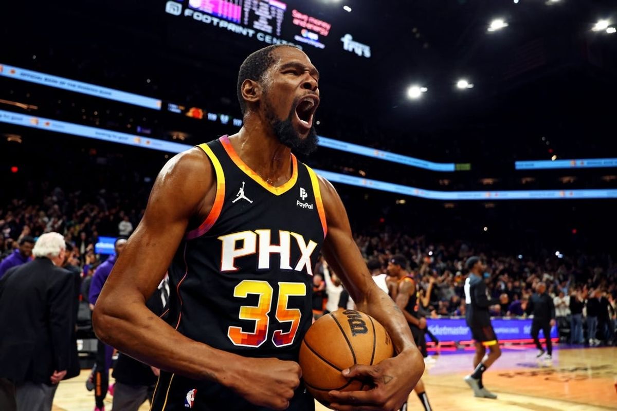 Jan 16, 2024; Phoenix, Arizona, USA; Phoenix Suns forward Kevin Durant (35) celebrates after beating the Sacramento Kings 119-117 at Footprint Center.
