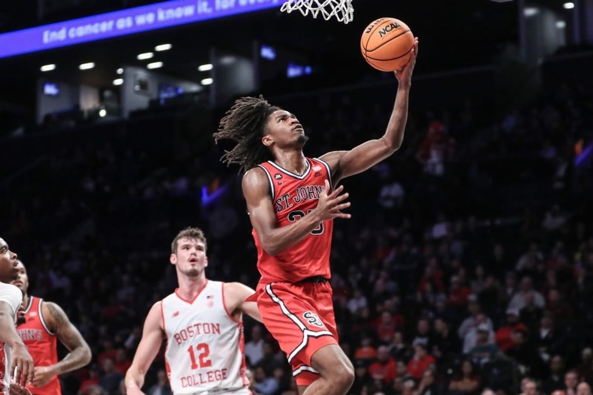 Dec 10, 2023; Brooklyn, New York, USA;  St. John's Red Storm forward Glenn Taylor Jr. (35) drives in for a layup in the first half against the Boston College Eagles at Barclays Center.