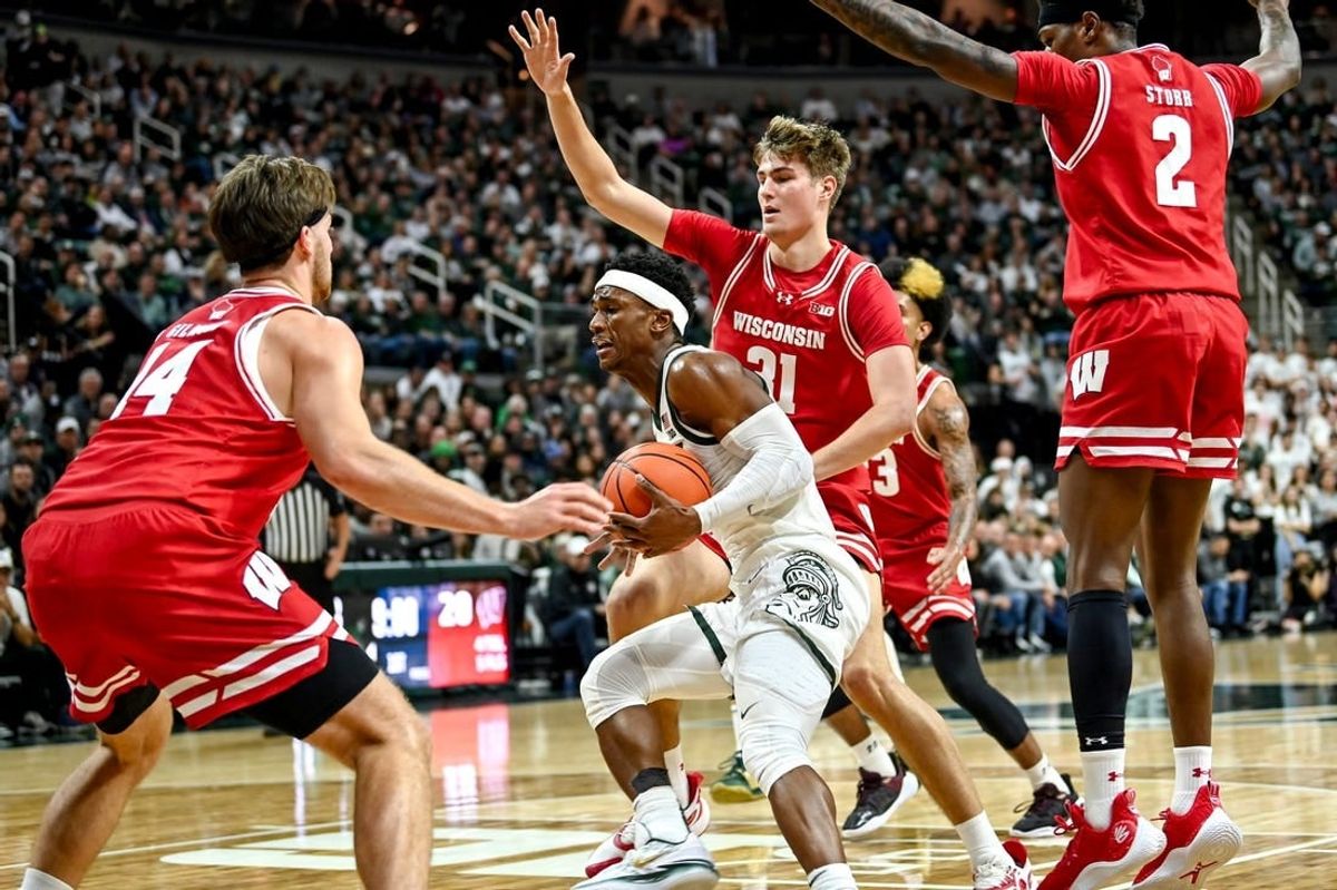 Michigan State's Tyson Walker moves to the basket before scoring against Wisconsin during the first half on Tuesday, Dec. 5, 2023, at the Breslin Center in East Lansing.