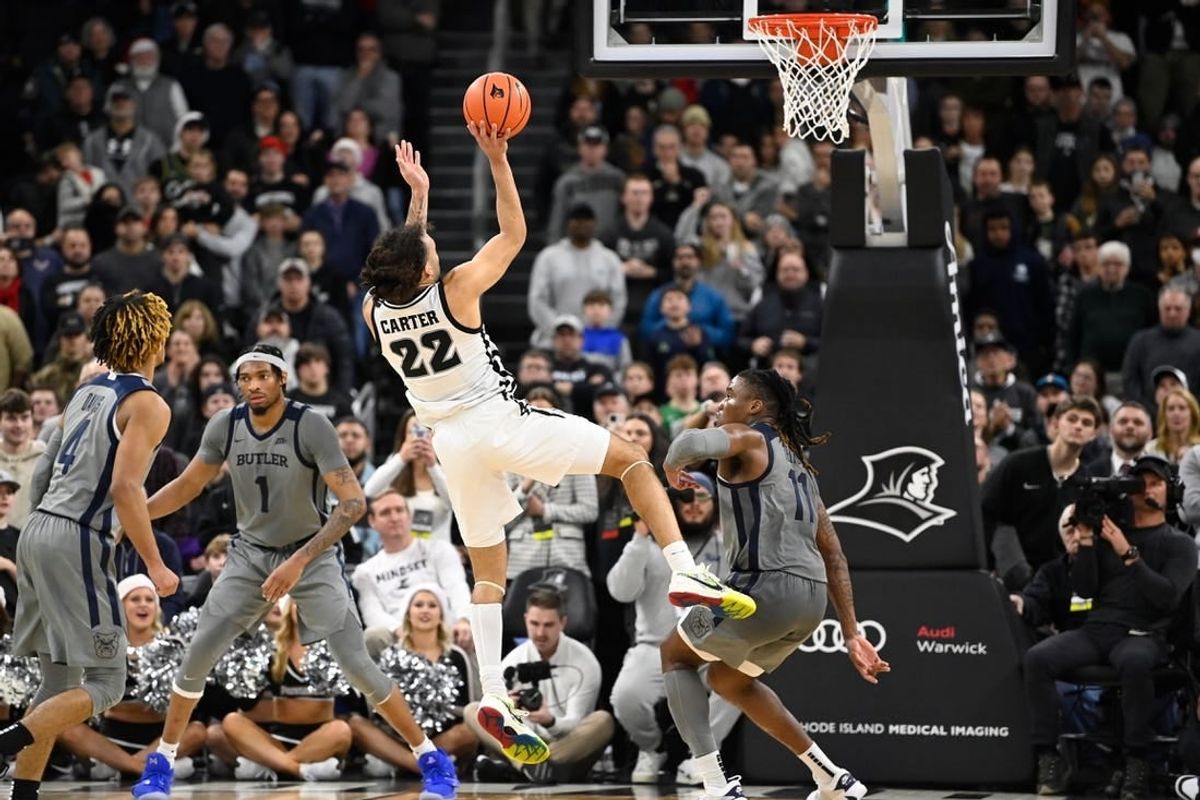 Dec 23, 2023; Providence, Rhode Island, USA; Providence Friars guard Devin Carter (22) shoots the ball against the Butler Bulldogs during overtime at Amica Mutual Pavilion.