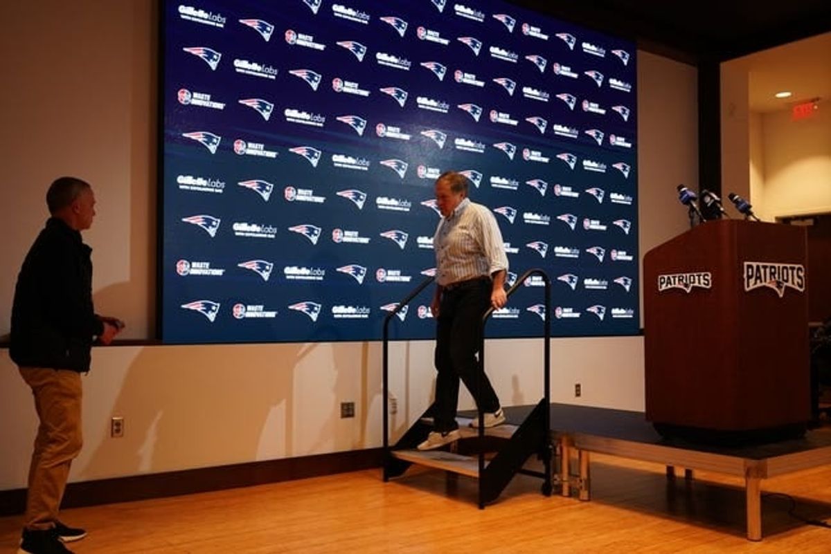 New England Patriots head coach Bill Belichick walks of the podium after talking to reporters after the game against the New York Jets at Gillette Stadium.