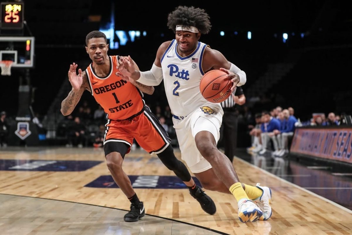 Nov 24, 2023; Brooklyn, NY, USA;  Pittsburgh Panthers forward Blake Hinson (2) drives past Oregon State Beavers guard Christian Wright (1) in the first half at Barclay Center.