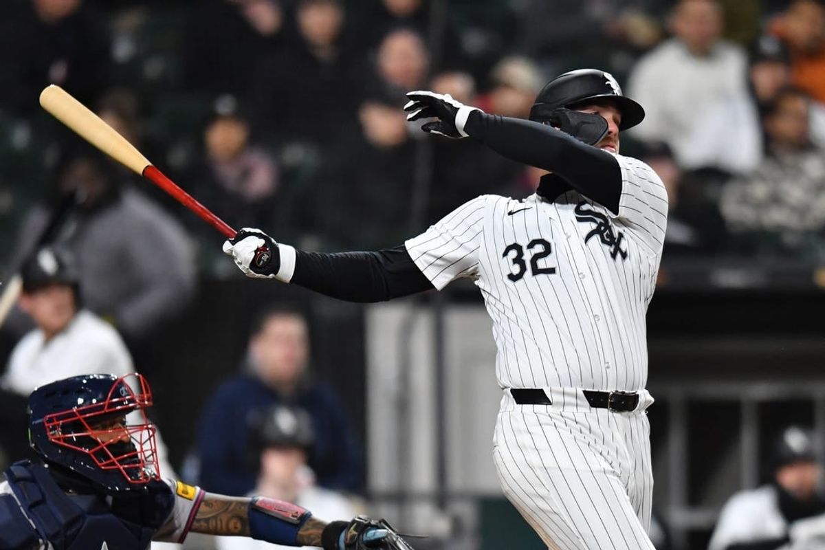 Apr 2, 2024; Chicago, Illinois, USA; Chicago White Sox designated Gavin Sheets (32) hits an RBI single during the sixth inning against the Atlanta Braves at Guaranteed Rate Field.