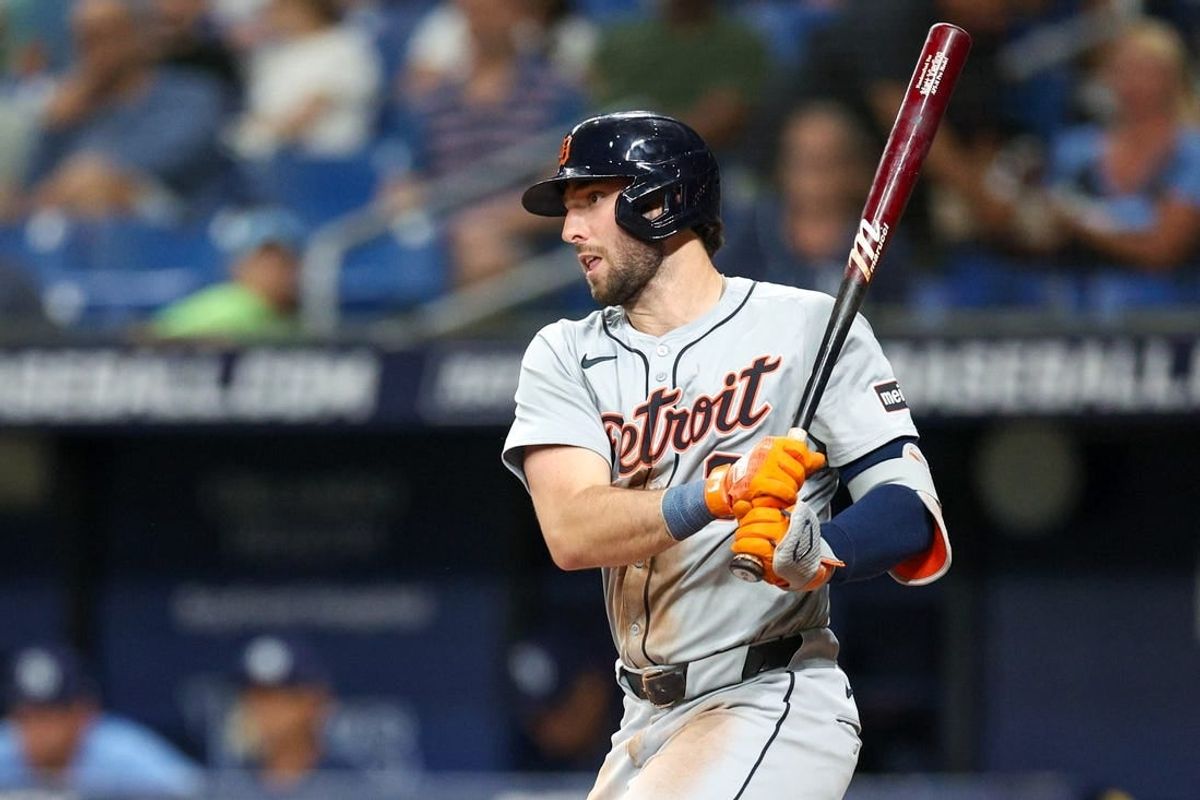 Apr 24, 2024; St. Petersburg, Florida, USA;  Detroit Tigers third baseman Matt Vierling (8) singles against the Tampa Bay Rays in the fourth inning at Tropicana Field.