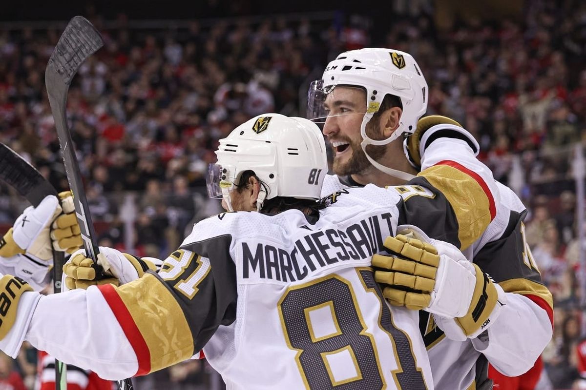 Jan 22, 2024; Newark, New Jersey, USA; Vegas Golden Knights center Nicolas Roy (10) celebrates his goal against the New Jersey Devils during the second period with right wing Jonathan Marchessault (81) at Prudential Center.