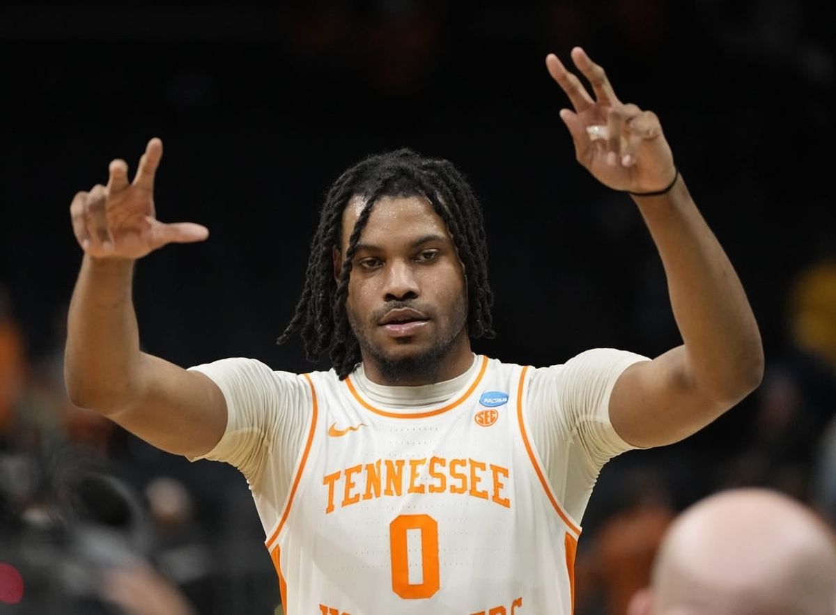 March 23, 2024, Charlotte, NC, USA;  Tennessee Volunteers forward Jonas Aidoo (0) celebrates defeating the Texas Longhorns in the second round of the 2024 NCAA Tournament at the Spectrum Center.