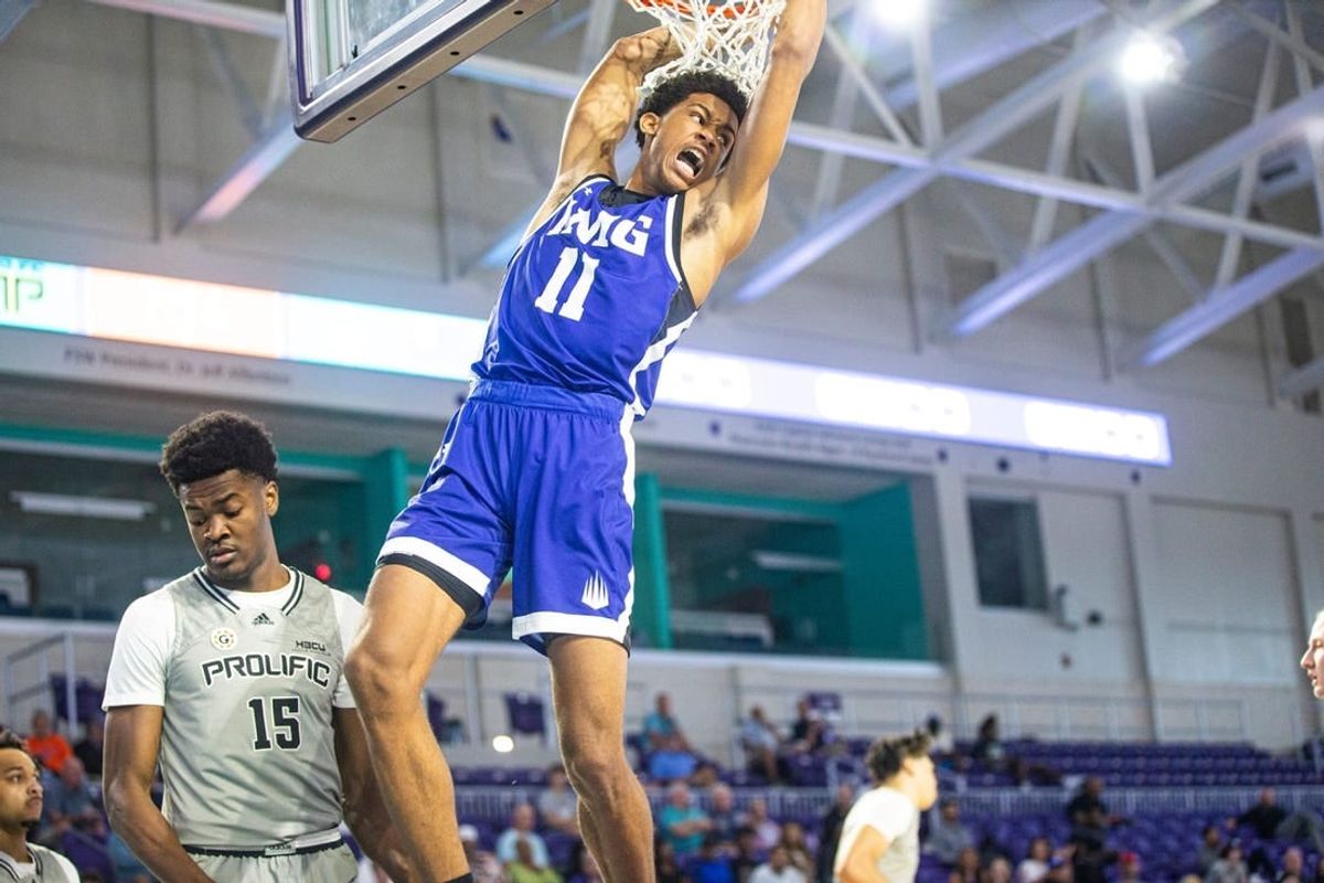 Khani Rooths of IMG Academy dunks  against Prolific Prep in GEICO High School Nationals quarterfinal game ay Suncoast Credit Union Arena on Thursday. IMG won.

Img Wins101