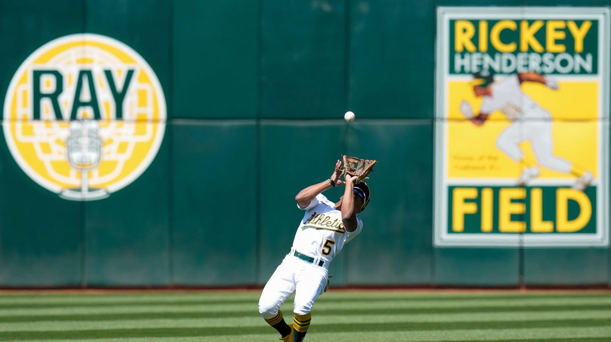 Oakland Athletics second baseman Tony Kemp catches a pop out by Chicago Cubs’ Patrick Wisdom during the eighth inning.