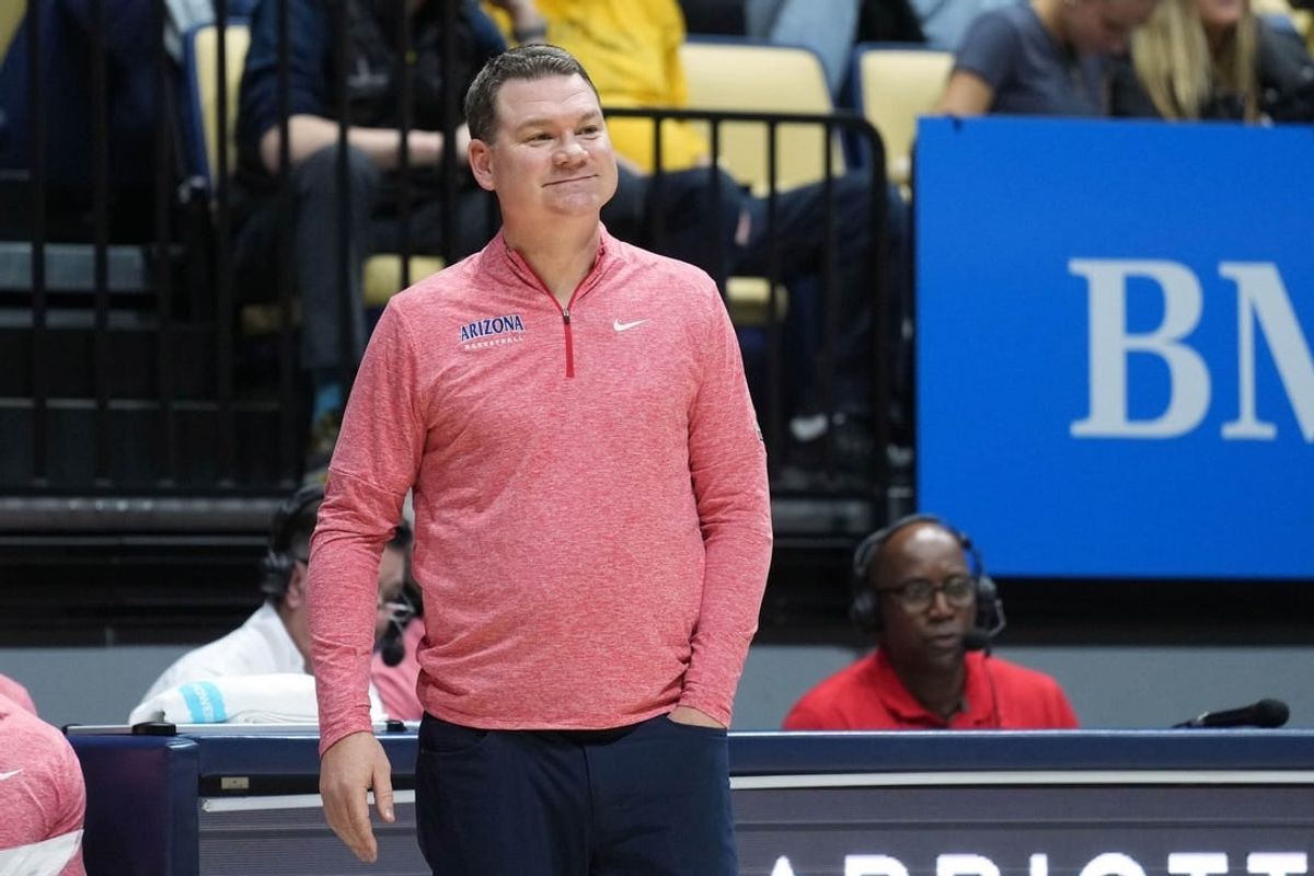 Dec 29, 2023; Berkeley, California, USA; Arizona Wildcats head coach Tommy Lloyd stands in front of the bench during the second half against the California Golden Bears at Haas Pavilion.