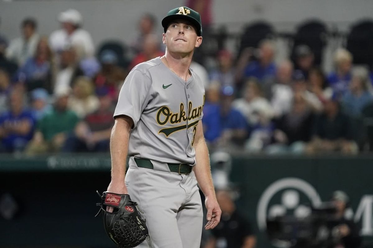 Apr 11, 2024; Arlington, Texas, USA; Oakland Athletics pitcher JP Sears (38) looks up at the scoreboard as he leaves the field after pitching in the sixth inning against the Texas Rangers at Globe Life Field.