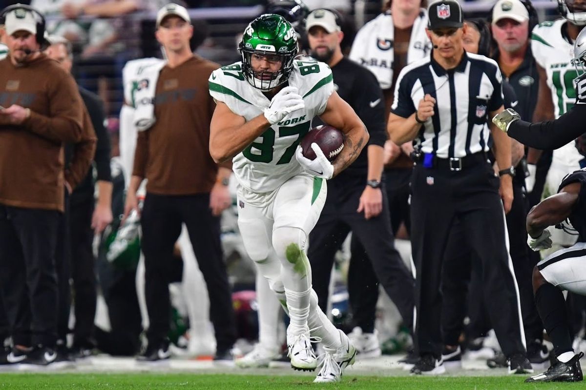 Nov 12, 2023; Paradise, Nevada, USA; New York Jets tight end C.J. Uzomah (87) runs the ball against the Las Vegas Raiders during the second half at Allegiant Stadium.