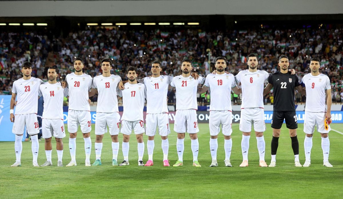 Iran players line up before a match against North Korea at Azadi Stadium in Tehran on June 10, 2025.
