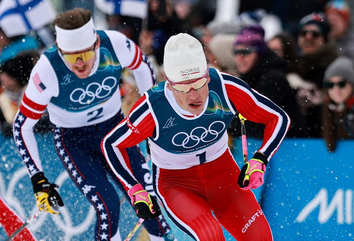 Milano Cortina 2026 Olympics - Cross-Country Skiing - Men's Sprint Classic Final - Tesero Cross-Country Skiing Stadium, Lago, Italy - February 10, 2026. Johannes Hoesflot Klaebo of Norway and Ben Ogden of United States in action during Men's Sprint Classic Final