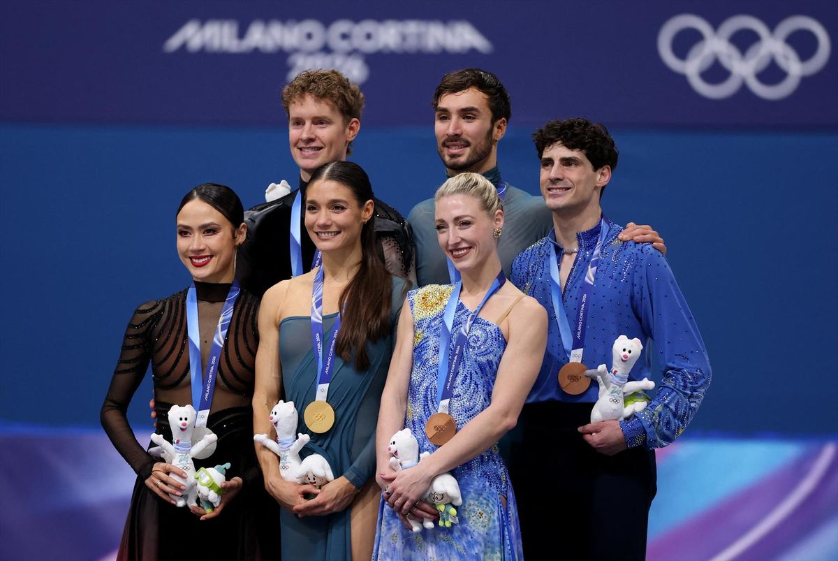 Milan Cortina 2026 Olympics - Figure Skating - Ice Dance - Victory Ceremony - Milano Ice Skating Arena, Milan, Italy - February 11, 2026. Gold medalists Laurence Fournier Beaudry of France and Guillaume Cizeron of France pose during the Ice Dance Victory Ceremony with silver medalists Madison Chock of United States and Evan Bates of United States and bronze medalists Piper Gilles of Canada and Paul Poirier of Canada.