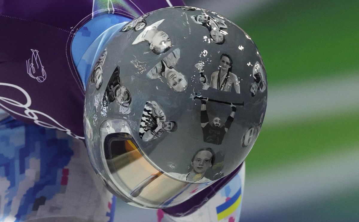 Milan Cortina 2026 Olympics - Skeleton - Men Official Training Heat 5 - Cortina Sliding Centre, Cortina d'Ampezzo, Italy - February 11, 2026. Vladyslav Heraskevych of Ukraine during training as he wears a helmet in tribute to athletes who have died amid Russia's attack on Ukraine