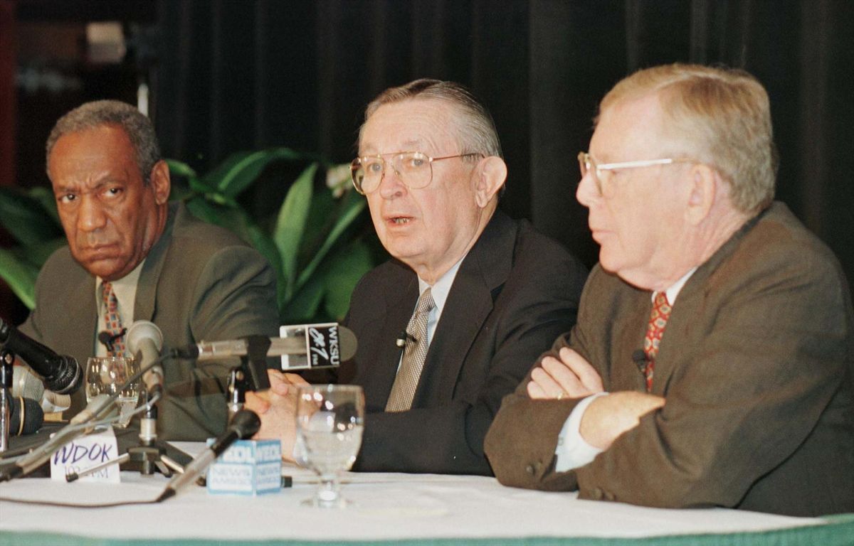 Larry Dolan (C), potential owner of the new Cleveland Browns, holds a news conference in Cleveland, June 2. Larry Dolan and brother Charles (R) submitted their ownership application to the National Football League in mid-May. At left is entertainer Bill Cosby, who would become a five percent owner of the team if the deal is completed.