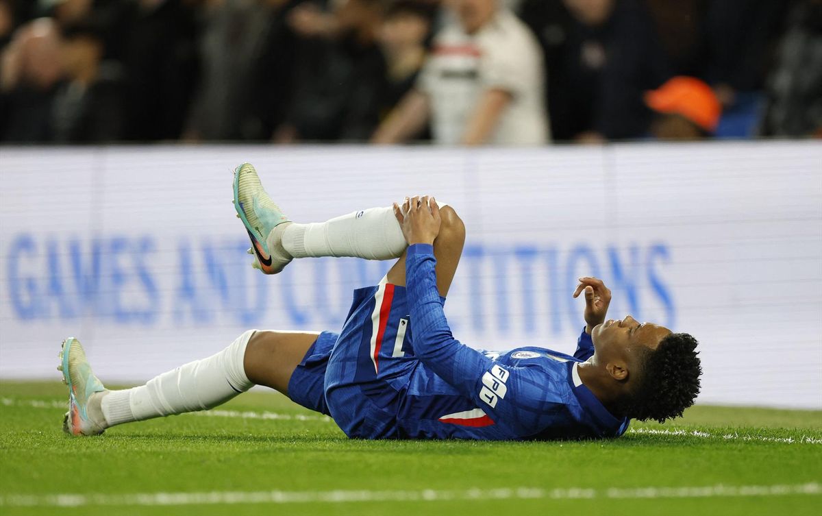 Chelsea's Estevao down injured in a match against Manchester United on April 18, 2026.