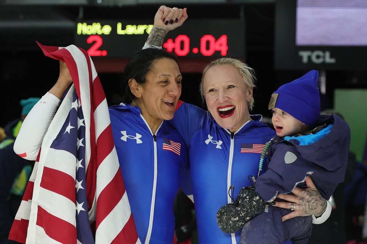 Milano Cortina 2026 Olympics - Bobsleigh - Women's Monobob Heat 4 - Cortina Sliding Centre, Cortina d'Ampezzo, Italy - February 16, 2026. Gold medallist Elana Meyers Taylor of United States celebrates with bronze medallist Kaillie Armbruster Humphries of United States.