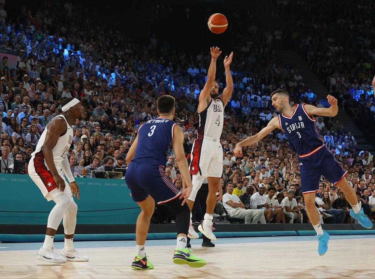Team USA's Steph Curry squares for a 3-pointer in the 2024 Olympic men's basketball semifinals against Serbia.