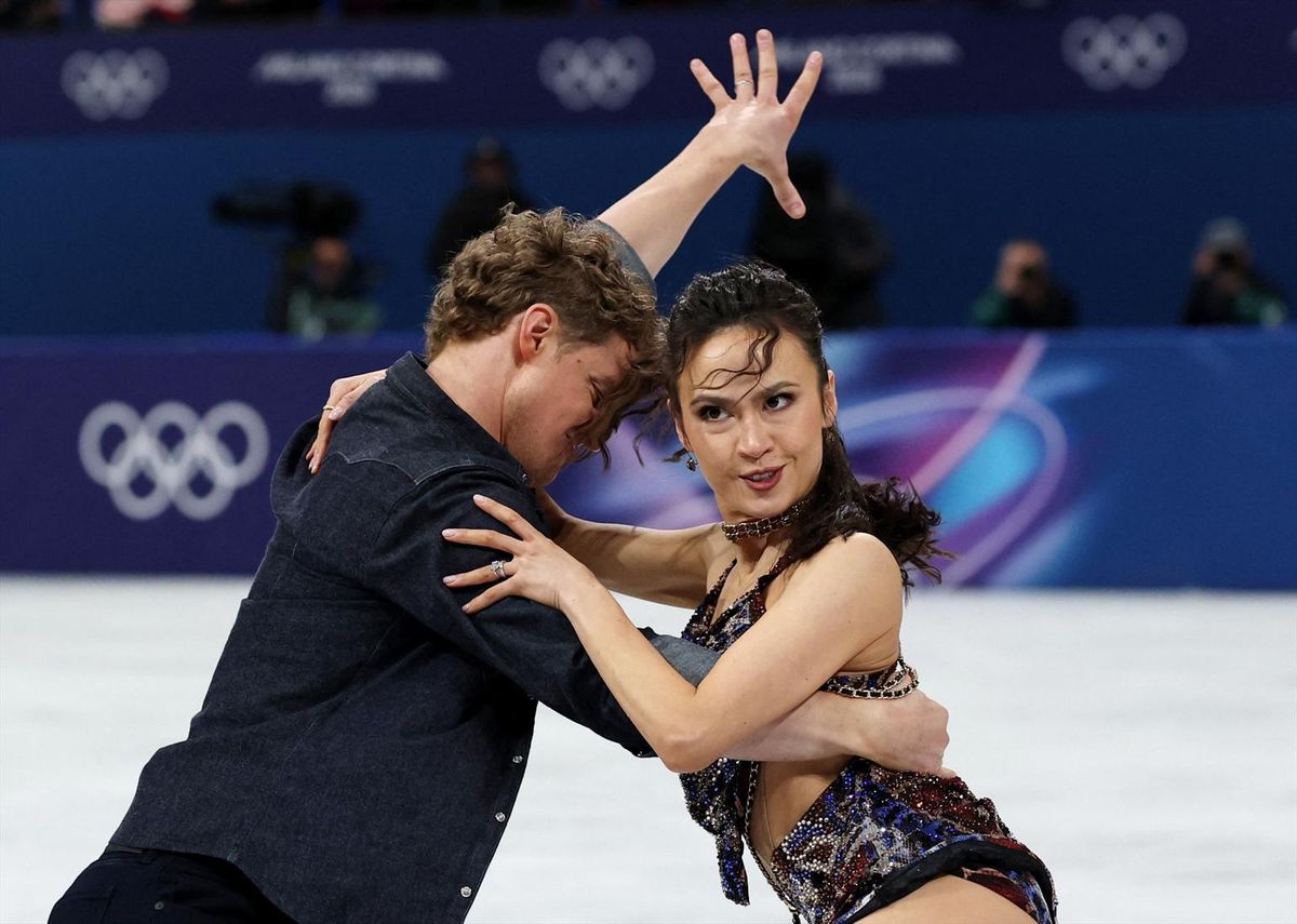 Madison Chock of United States and Evan Bates of United States perform during the ice dance rhythm dance short program as part of the team competition at the Milano Cortina Olympics on Feb. 6.