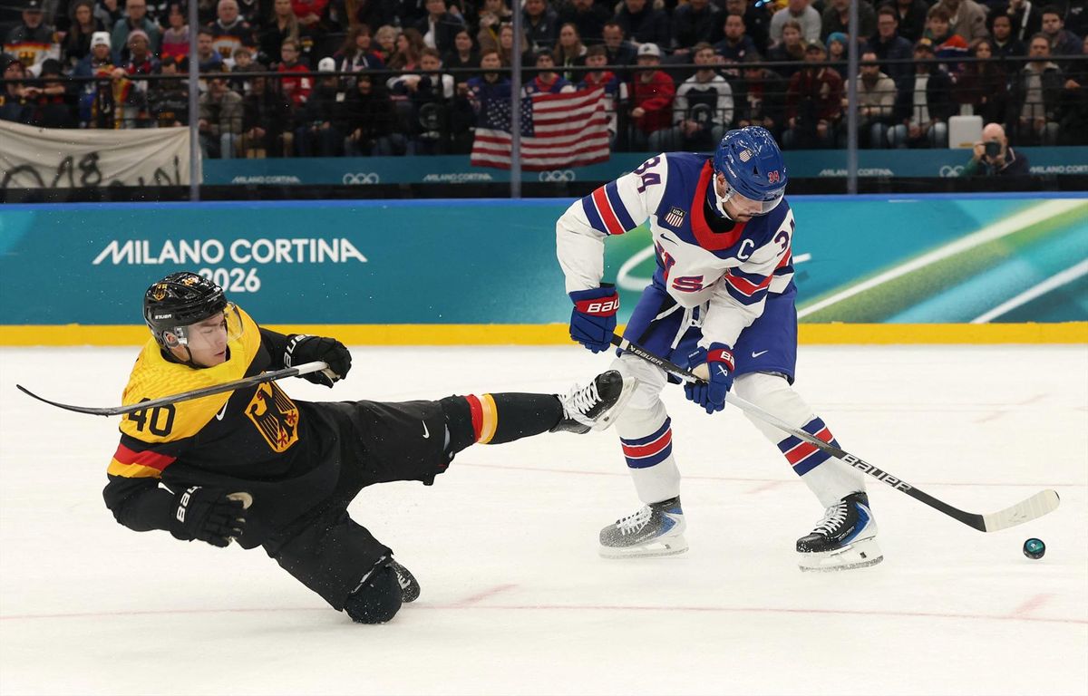 Milano Cortina 2026 Olympics - Ice Hockey - Men's Preliminary Round - Group C - United States vs Germany - Milano Santagiulia Ice Hockey Arena, Milan, Italy - February 15, 2026. Auston Matthews of United States in action with Alexander Ehl of Germany