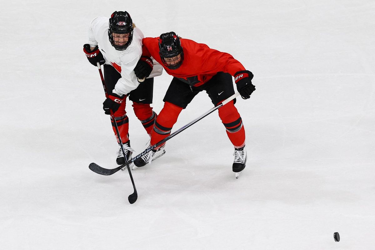 Renata Fast and Emma Maltais of Canada during training ahead of the 2026 Milano Cortina Olympics
